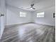 Spacious bedroom features wood-look floors and bright white paint at 2400 Glenrock Dr, Decatur, GA 30032