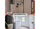 Bright laundry room features a washer, dryer, new paint and flooring, and a backyard access door at 2400 Glenrock Dr, Decatur, GA 30032