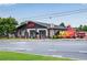 StillFire Brewing exterior features a modern design, outdoor seating, and a food truck area at 260 Roberts Rd, Suwanee, GA 30024