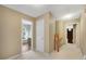 Upstairs hallway with carpet and doorway to office/bedroom at 260 Roberts Rd, Suwanee, GA 30024