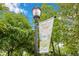 Street lamp with Suwanee Georgia Banner and trees around it at 260 Roberts Rd, Suwanee, GA 30024