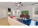 Open-concept living room features lots of natural light and a staircase to the upper level at 520 Amethyst Way, Stockbridge, GA 30281