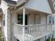 A spacious balcony with wooden floors and railings offering a quiet outdoor seating space at 904 Bridge Se Ln, Smyrna, GA 30082