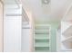 Well-organized closet featuring white shelving and metal rods, ideal for efficient storage solutions at 904 Bridge Se Ln, Smyrna, GA 30082