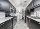 Modern kitchen with stainless steel appliances and dark cabinets at 904 Bridge Se Ln, Smyrna, GA 30082