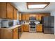 Well-equipped kitchen with stainless steel appliances, ample cabinets, and a convenient layout at 100 Gum Creek Lndg, Oxford, GA 30054