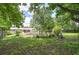Large backyard with a partially shaded area and an in-ground pool at 1095 Dallas Nebo Rd, Dallas, GA 30157