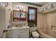 This bathroom has a sink, commode and bath tub with shower at 1095 Dallas Nebo Rd, Dallas, GA 30157