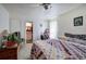 Cozy bedroom features a ceiling fan and adjacent bathroom access at 1095 Dallas Nebo Rd, Dallas, GA 30157