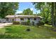 Charming single-story home featuring a covered porch and well-manicured front yard at 1095 Dallas Nebo Rd, Dallas, GA 30157