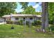 Charming single-story home featuring a covered porch and well-manicured front yard at 1095 Dallas Nebo Rd, Dallas, GA 30157