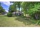 Charming home with a well-manicured front lawn and a welcoming porch at 1095 Dallas Nebo Rd, Dallas, GA 30157