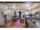 Comfortable living area adjacent to the kitchen, featuring wood floors and vintage furnishings at 1095 Dallas Nebo Rd, Dallas, GA 30157