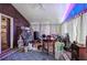Enclosed sunroom featuring a ceiling fan and lots of clutter at 1095 Dallas Nebo Rd, Dallas, GA 30157