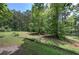 Partially shaded, expansive yard perfect for outdoor recreation and relaxation at 1095 Dallas Nebo Rd, Dallas, GA 30157