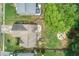 Aerial view of backyard with fire pit, playset, and outdoor seating at 3514 Ethridge Nw Ln, Kennesaw, GA 30144