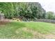 Large backyard with mature trees and a fire pit with plenty of room to entertain at 3514 Ethridge Nw Ln, Kennesaw, GA 30144