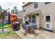 Backyard with patio, outdoor seating, grill, playset, and rear entrance at 3514 Ethridge Nw Ln, Kennesaw, GA 30144