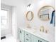 Bathroom featuring double sinks, and round mirror at 3514 Ethridge Nw Ln, Kennesaw, GA 30144