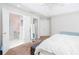 Bright bedroom with neutral walls, large closet, and doorway to bathroom at 3514 Ethridge Nw Ln, Kennesaw, GA 30144