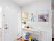 Bright entryway featuring white wainscoting, console table, and artwork on the wall at 3514 Ethridge Nw Ln, Kennesaw, GA 30144