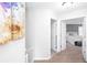 Hallway view leading to a bright bedroom with ample natural light and neutral tones at 3514 Ethridge Nw Ln, Kennesaw, GA 30144