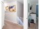 Upstairs hallway featuring carpet floors, an accent wall and well lit playroom at 3514 Ethridge Nw Ln, Kennesaw, GA 30144