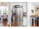 Bright kitchen featuring stainless steel appliances and a view into the dining area at 3514 Ethridge Nw Ln, Kennesaw, GA 30144