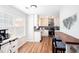 Charming kitchen with a breakfast bar, stainless appliances, and ample natural light at 3514 Ethridge Nw Ln, Kennesaw, GA 30144