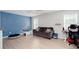 Bright living room features sleek floors, a chalkboard wall, and a comfortable seating area perfect for Gathering time at 3514 Ethridge Nw Ln, Kennesaw, GA 30144