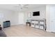 Spacious living area with sleek floors, white trim, and lots of storage space at 3514 Ethridge Nw Ln, Kennesaw, GA 30144
