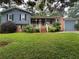 Charming two-story home with brick accents and a well-maintained front lawn at 4718 City View Dr, Forest Park, GA 30297