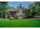 View of the back of the house with a deck, patio, and walkout basement at 118 Whitestone Dr, Mcdonough, GA 30253