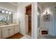 Clean bathroom featuring walk-in shower, vanity with great lighting, and ample counter space at 118 Whitestone Dr, Mcdonough, GA 30253
