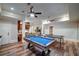 Spacious game room with a pool table, ping pong table, wood-look flooring, and recessed lighting at 118 Whitestone Dr, Mcdonough, GA 30253