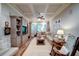 Inviting living room with coffered ceilings, hardwood floors, built-ins, and ample seating at 118 Whitestone Dr, Mcdonough, GA 30253
