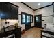 Mud room with dark trim, tile flooring, and built-in desk at 118 Whitestone Dr, Mcdonough, GA 30253