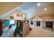 Spacious playroom with unique built-in playhouse, ladder and slide for indoor fun at 118 Whitestone Dr, Mcdonough, GA 30253