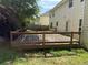 Spacious backyard with a wooden deck, perfect for outdoor gatherings and relaxation at 257 Juliet Dr, Hampton, GA 30228