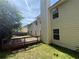 Backyard featuring a wooden deck, ideal for outdoor entertaining and relaxation at 257 Juliet Dr, Hampton, GA 30228