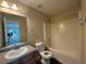 Bathroom featuring a single sink, shower and tub at 257 Juliet Dr, Hampton, GA 30228