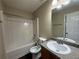 Full bathroom featuring a shower-tub combination, white toilet and single sink vanity at 257 Juliet Dr, Hampton, GA 30228