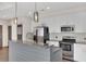 Modern kitchen featuring stainless steel appliances, granite counters and stylish backsplash at 44 Peachtree Nw Pl # 2024, Atlanta, GA 30309