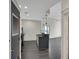 Chic kitchen with an island, sleek countertops, and stainless steel appliances, open to living area at 44 Peachtree Nw Pl # 2024, Atlanta, GA 30309