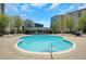Refreshing swimming pool surrounded by comfortable lounge chairs and lush landscaping for relaxation at 44 Peachtree Nw Pl # 2024, Atlanta, GA 30309