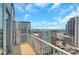 Balcony view showcasing the surrounding cityscape with clear skies, offering stunning city views at 44 Peachtree Nw Pl # 2024, Atlanta, GA 30309