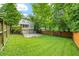Expansive backyard with lush lawn, privacy fence, and ample space for recreation and entertaining at 66 Mobile Ne Ave, Atlanta, GA 30305