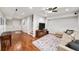 Spacious basement featuring hardwood flooring, a comfortable seating area, and stylish design elements at 66 Mobile Ne Ave, Atlanta, GA 30305