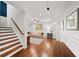 Finished basement with hardwood floors and staircase at 66 Mobile Ne Ave, Atlanta, GA 30305