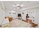 Basement with hardwood floors, a ceiling fan, and an open layout with flexible space and a TV area at 66 Mobile Ne Ave, Atlanta, GA 30305